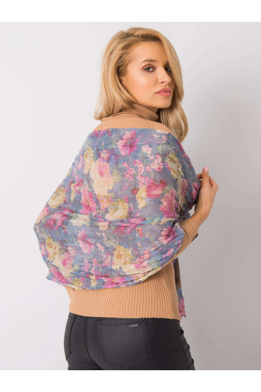 Zilā ietīšana ar ziedu rakstu